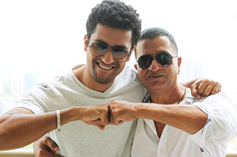With his son Vicky